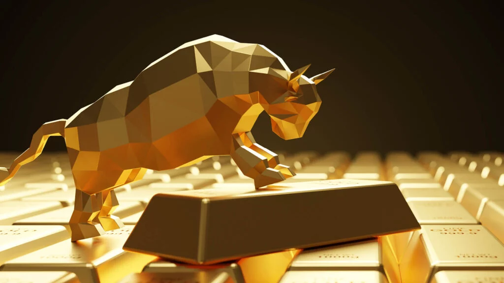 Golden bull standing on the gold bars