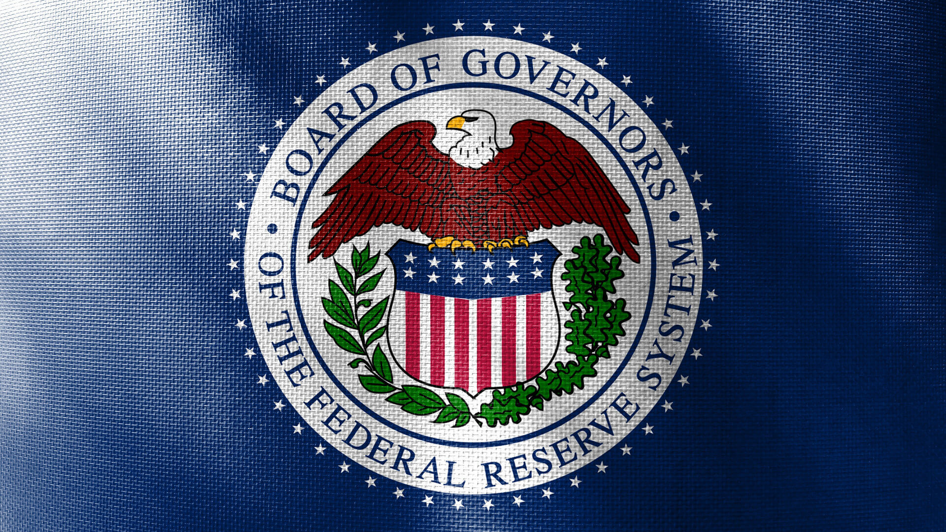 The Federal Reserve System seal on blue background